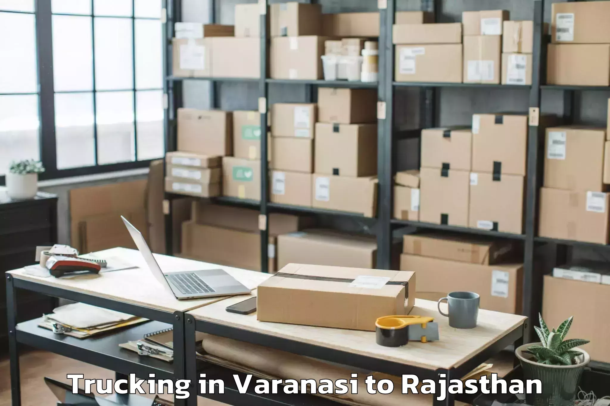 Top Varanasi to Dausa Trucking Available